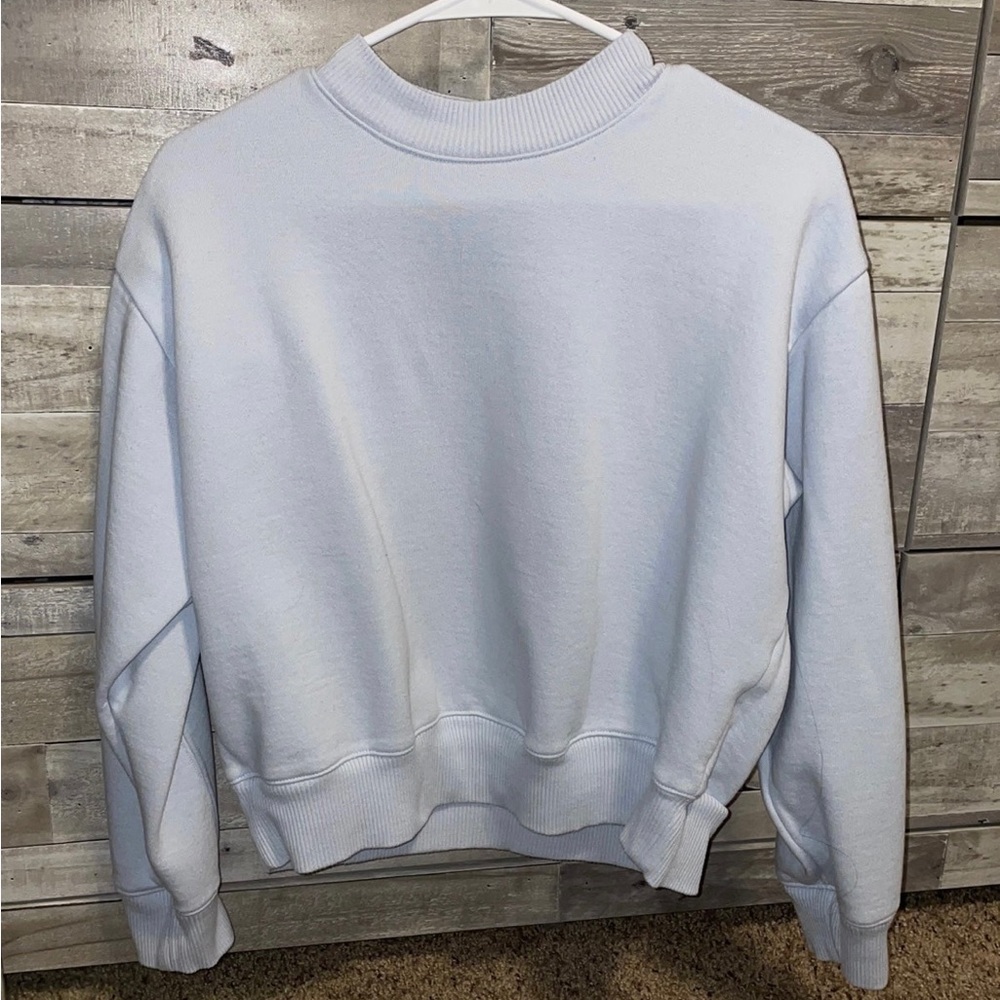 Super cute light blue sweater. size small and in perfect condition!